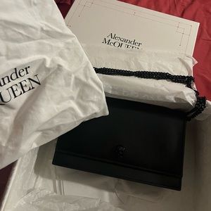 An authentic Alexander McQueen Bag, I used it for 2 or 3 times, no scratches.